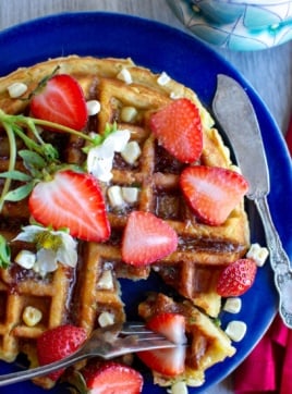 sweet corn waffles topped with strawberries