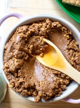 churros con chocolate peanut butter with a spoon