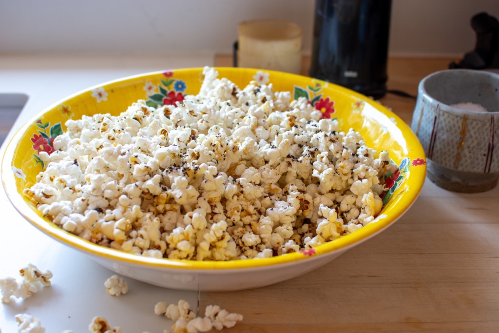 chili lime popcorn in a yellow bowl 
