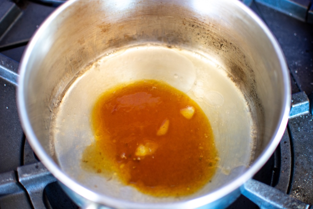 honey and coconut oil in a saucepan