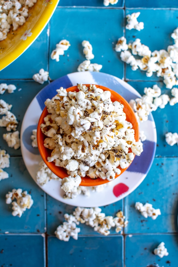 chili lime popcorn in an orange bowl