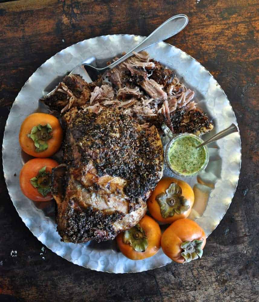This Slow Roasted Pork Shoulder is a delicious holiday meal that requires no work. Coat the roast with garlic and orange zest and roast until super tender.