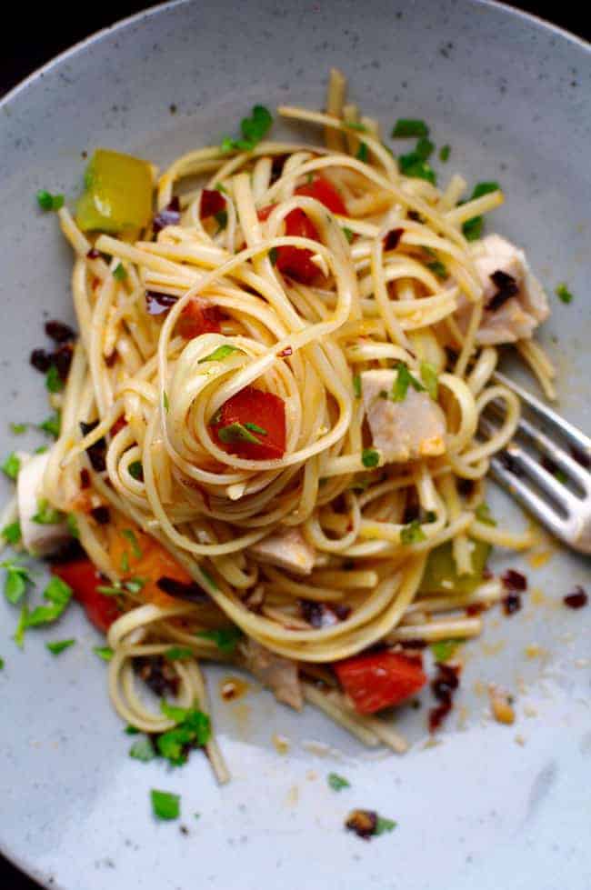 How to make a delicious heirloom tomato and guajillo pasta with tuna recipe for a healthy weeknight meal using the best of summer's ingredients.