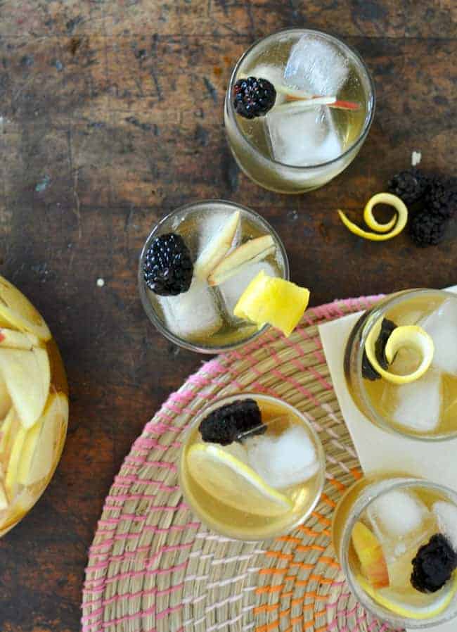 This hard cider sangria is just like traditional wine-based sangria except it is made from hard apple cider instead! With fresh blackberries it is yummy!