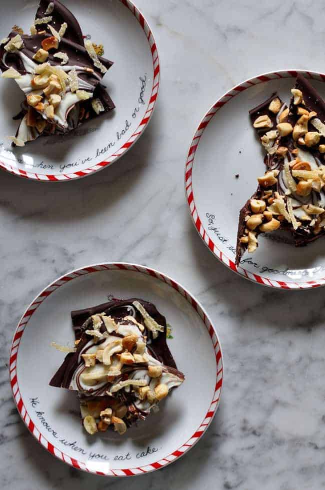 Homemade dark chocolate bark recipe with swirls of white chocolate for a beautiful marble design topped with roasted cashews and candied ginger.