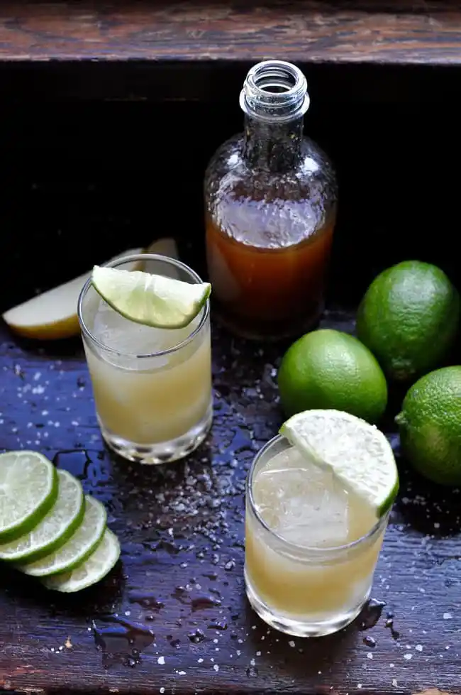 two glasses filled with apple margarita 
