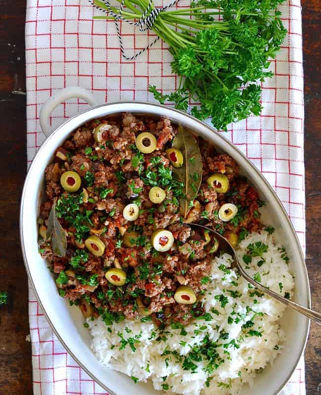 A family favorite, this Cuban Picadillo is made with ground beef, cured chorizo sausage, tomatoes, olives, garlic, and raisins. Dairy and gluten free!