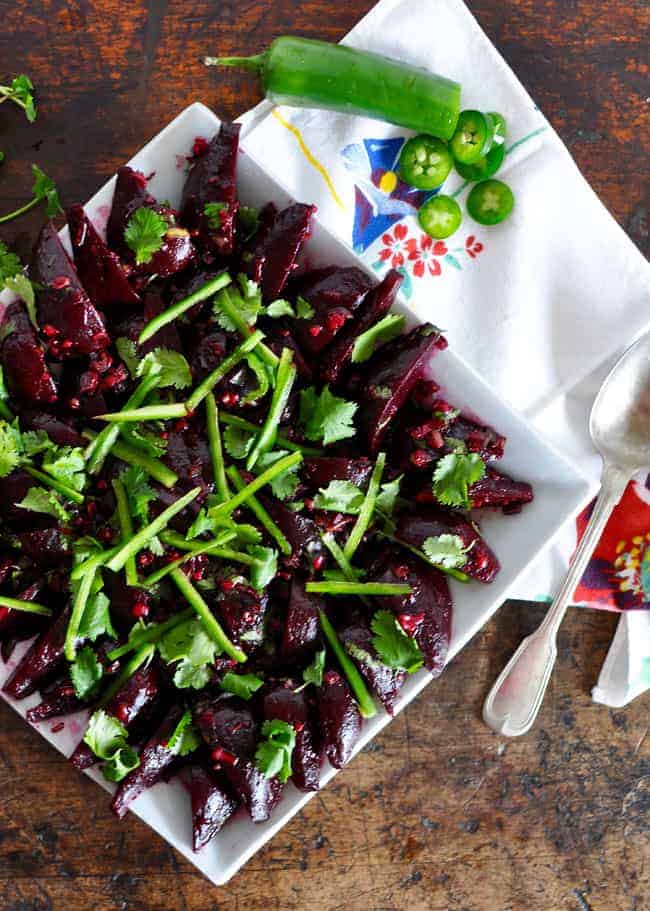 Perfect for picnics, this roasted beet salad can be made in advance and gets better as the beets marinate in the jalapeño, garlic and lime dressing.