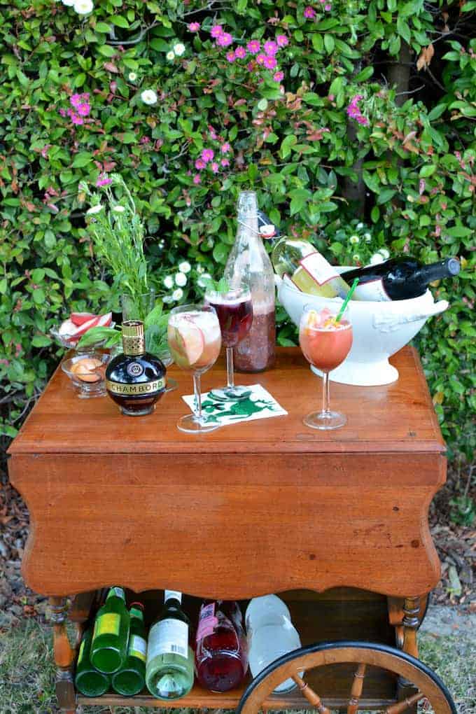 A DIY Chambord Sangria Bar is where it's at this summer! You make the fruity sangria base with Chambord and nectarines and let your friends do the rest.