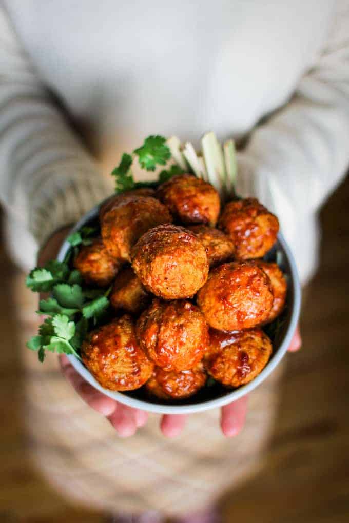 These Honey Chipotle Cocktail Meatballs make a stunningly simple party appetizer with just three ingredients, they are made as fast as they disappear.