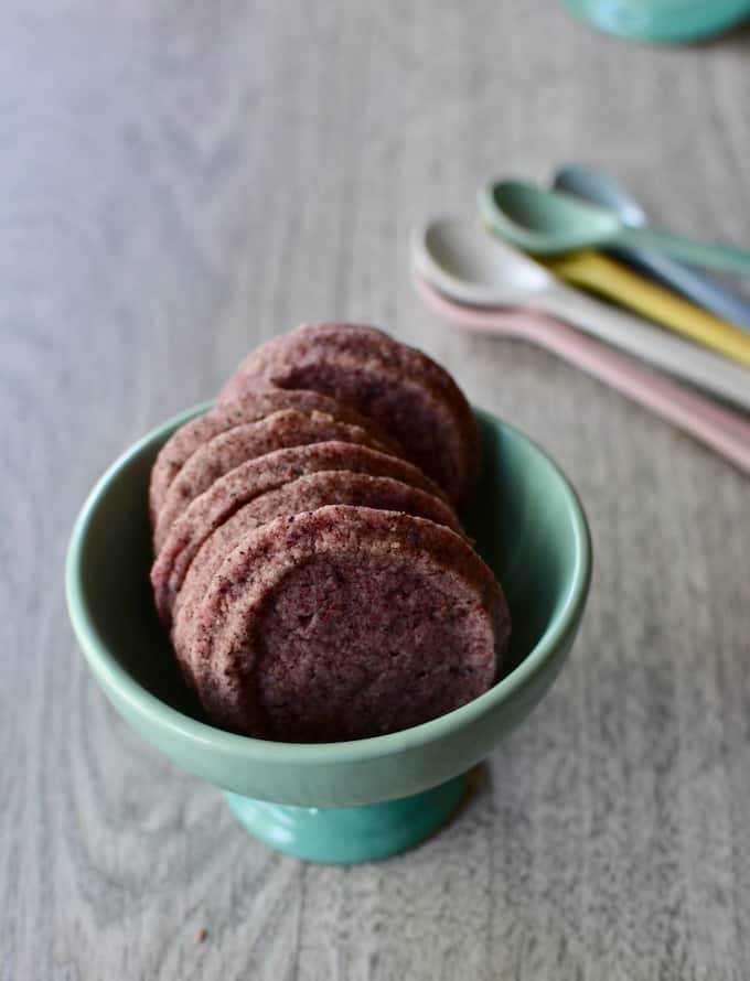 Nothing says spring like these seductively purple Strawberry Hibiscus Cookies. They sound sophisticated but they are really just a simple slice-and-bake. Keep a roll of dough in the fridge for all of spring's celebrations. #easycookierecipe #hibiscusrecipe #sliceandbakecookierecipe