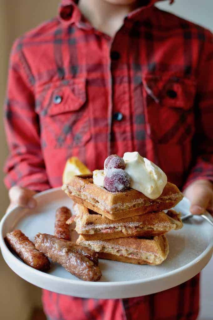 This indulgent Mexican-Inspired Holiday Brunch with Churro-Bacon Waffles, Ponche Braised Breakfast Sausage and more is what cozy mornings with friends and family are made for. This menu is perfect for Christmas morning, New Year's Day, or any time this holiday season that calls for long, luxurious meals that satisfy every craving. #brunch #holidaybrunch #mexicanbrunch #christmasbrunch #newyearsbrunch #sausage #bacon #ad #FarmerJohn