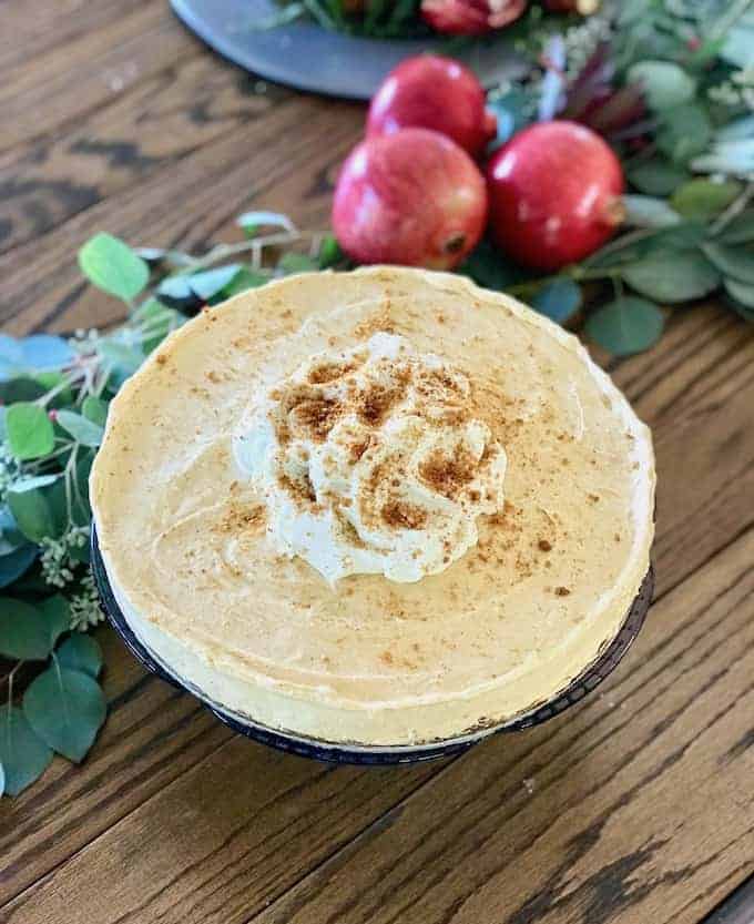 Sweet, creamy, with a hint of heat this No-Bake Pumpkin Chipotle Cheesecake is not only easy to pull off (ready: no oven necessary) but tastes heavenly with a gingersnap cookie crust and a rich, silky filling. Make ahead and freeze for up to a week. Perfect for Thanksgiving! #thanksgiving #nobakecheesecake #cheesecake #pumpkincheesecake #nobake #easythanksgiving #easydessert