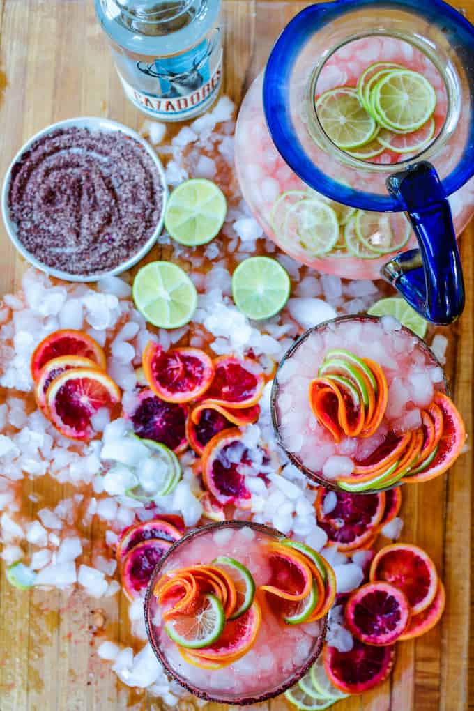 Celebrate National Margarita Day the best way we know how, with a Sparkling Blood Orange Margarita Recipe! Instructions for making one or a whole pitcher. {ad} #margarita #margaritarecipe #bloodorange #bloodorangemargarita