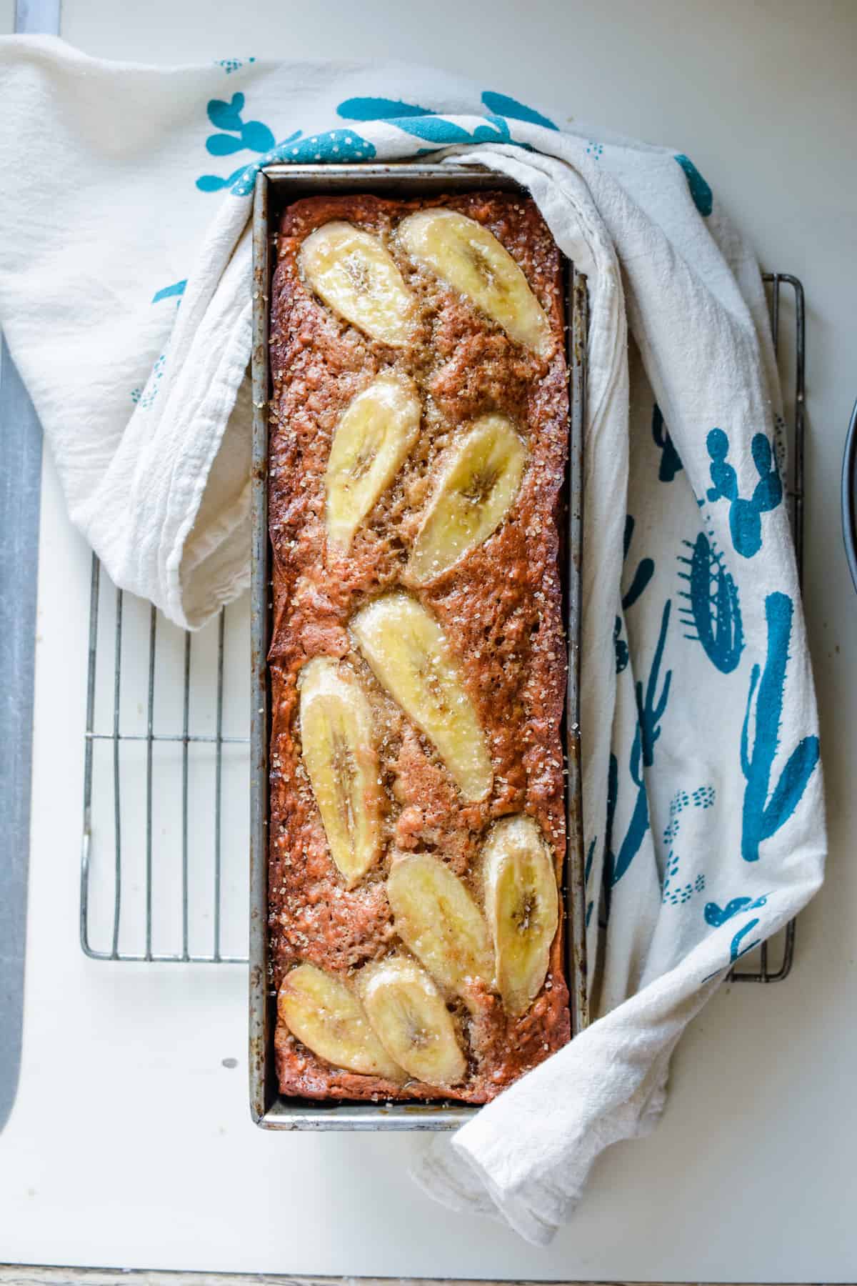 There are a mountain of banana bread recipes out there, but this Molasses Banana Bread with it's dark, caramel undertones, is the only one I make. Click now for this one-bowl, dairy-free banana bread recipe. #bananabread #easybananabread #molasses #dairyfreebananabread