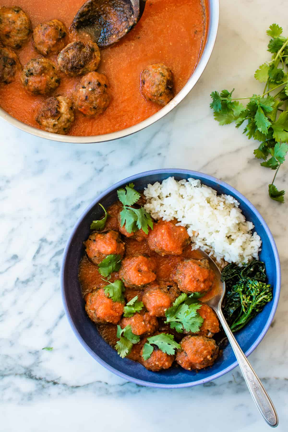 Pork Albondigas with Árbol Chile Tomato Sauce- an easy main dish, perfect for a quick meal. Tender meatballs made with lots of fresh herbs and ground pork in a slightly spicy, delicate tomato sauce. Serve with Coconut-Cilantro Rice and Garlicky Broccolini for a super tasty dinner. #pork #ad #albondigas #meatballs