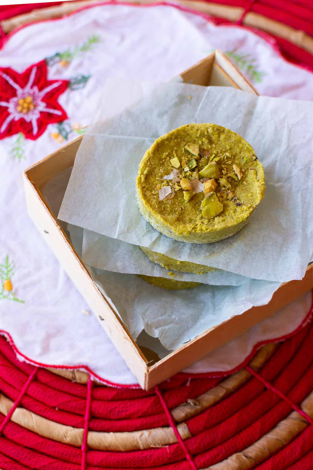 The traditional Mexican candy, Mazapan gets a little makeover with pistachios instead of peanuts. This easy no bake sweet is perfect for homemade holiday gifts or to put on a Christmas cookie platter. Vegan and gluten-free! #mazapan #pistachios #mazapancandy #mexicancandy
