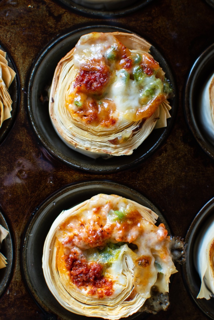 choriqueso pinwheels in the muffin tin