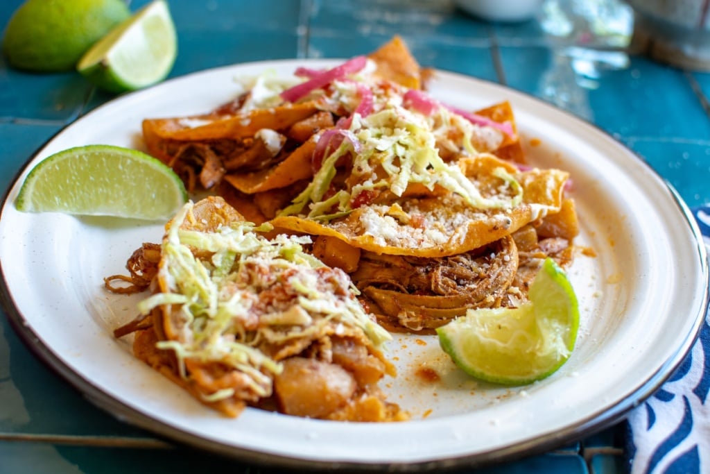 tacos al vapor with a bite taken out of one of them