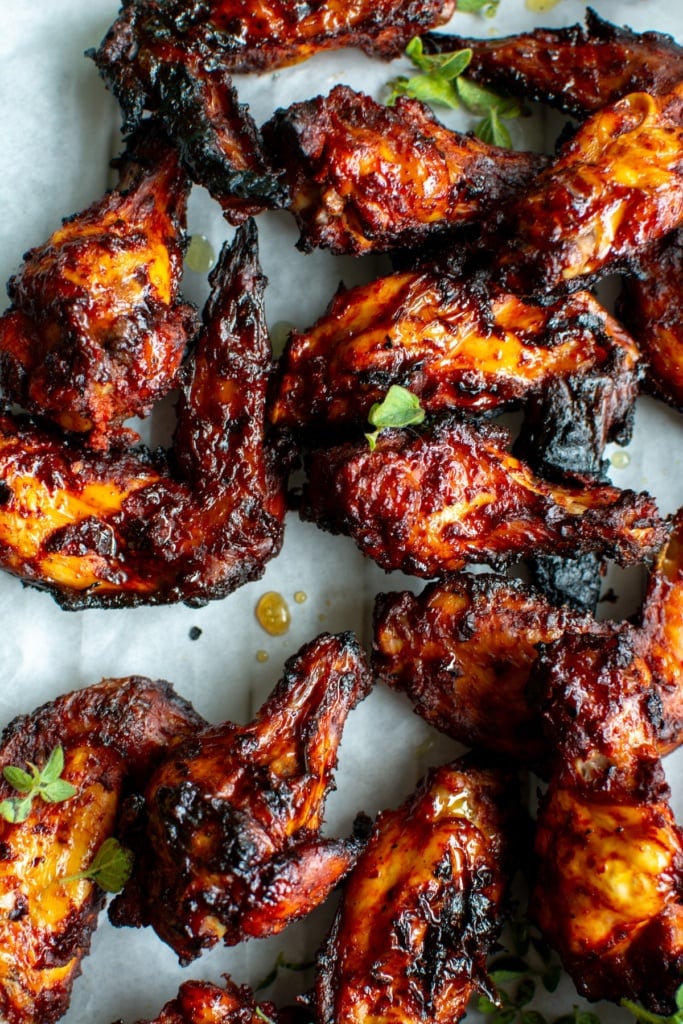al pastor chicken wings on a grey table