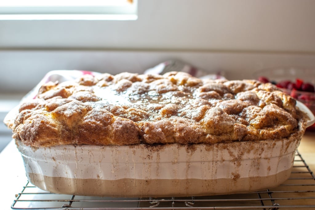 churro bread pudding sitting on a wire rack