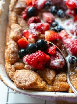 churro French toast casserole with berries on top