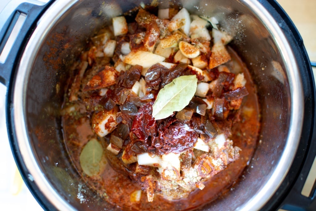 All the ingredients in the Instant Pot to make the shredded beef. 