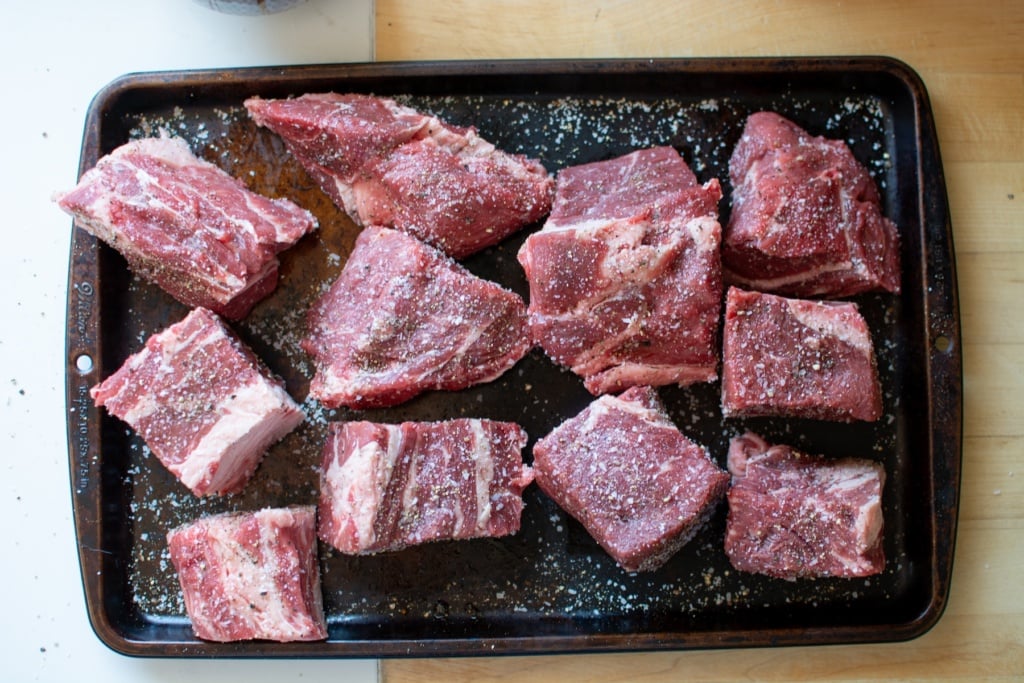 pieces of meat seasoned with salt and pepper