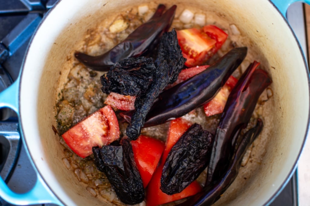 tomatoes and dried chiles in a pot