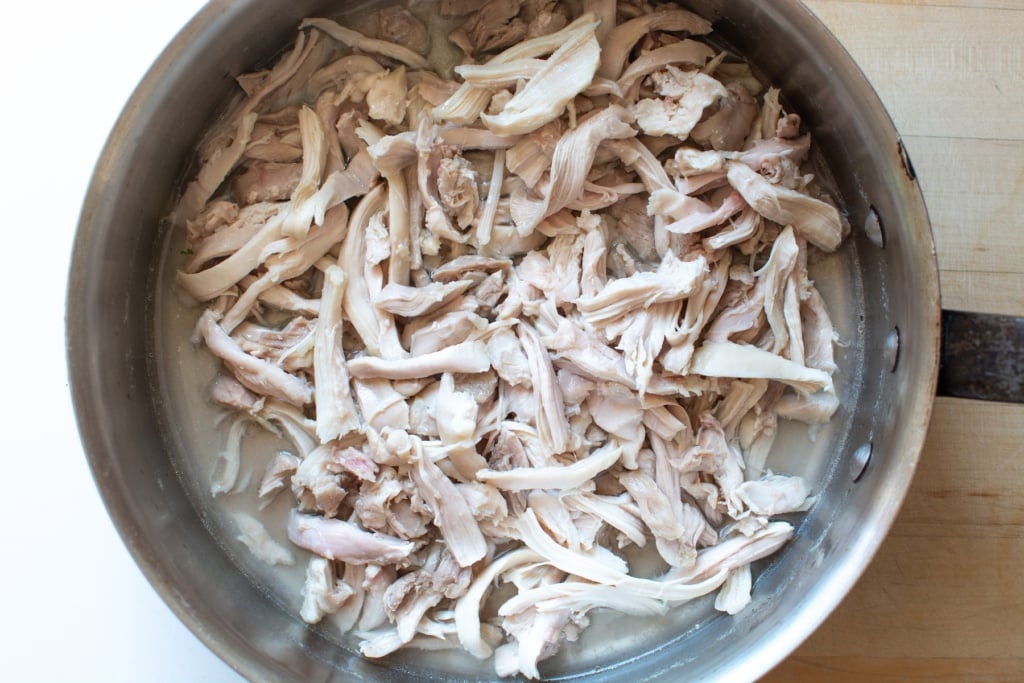 shredded chicken inside a pot