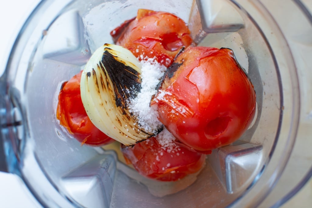 toasted tomatoes and onion with salt in a blender
