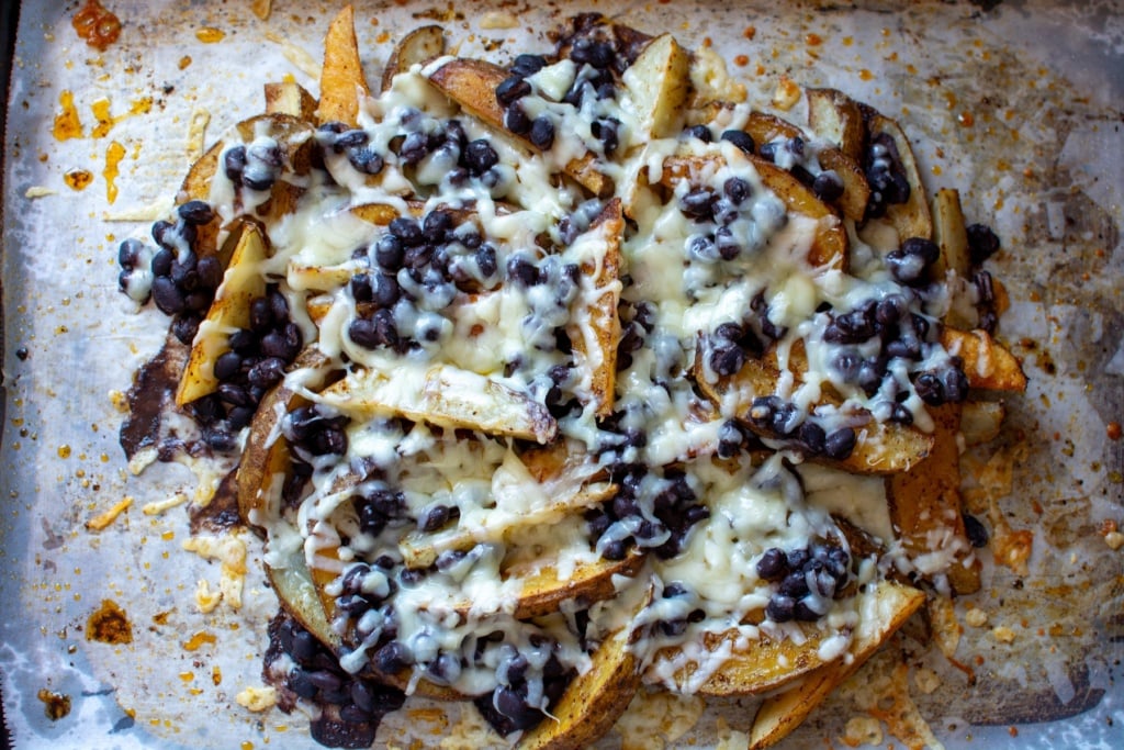 steak fries topped with black beans and cheese