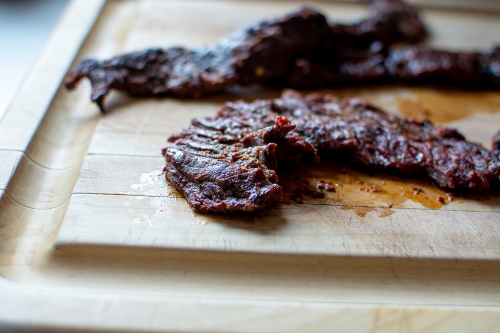 grilled skirt steak on a cutting board