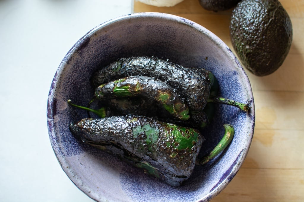 charred peppers in a bowl
