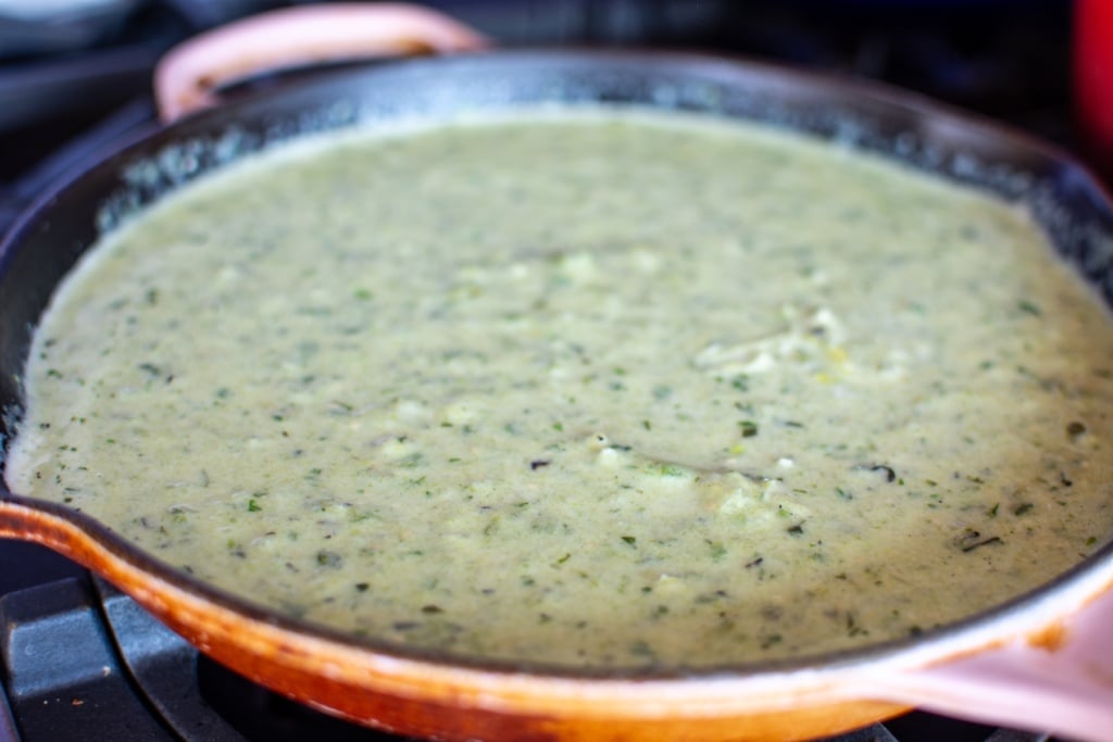 enchilada suiza sauce in a pan