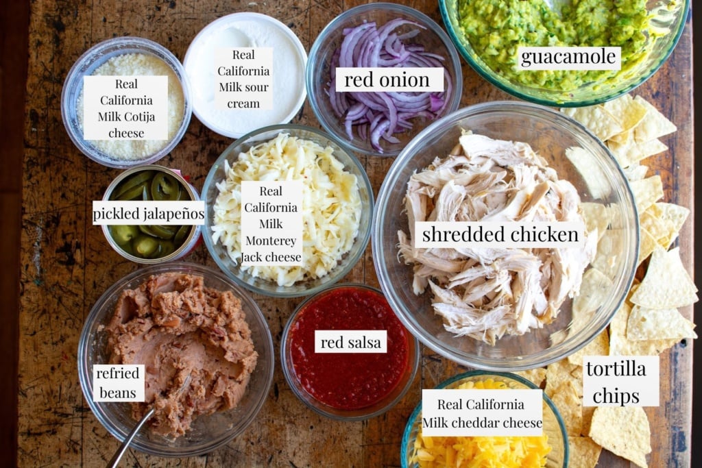 All the ingredients needed to make shredded chicken nachos