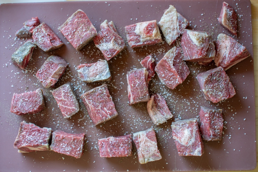 beef pieces on a cutting board