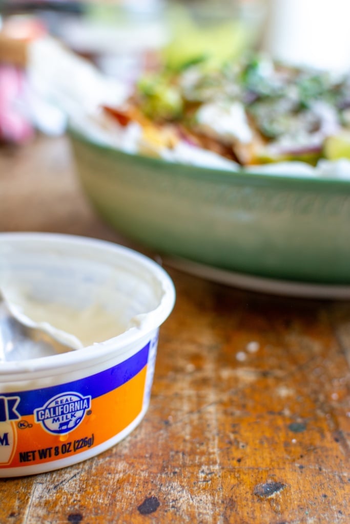 a tub of sour cream showing the Real California Milk logo