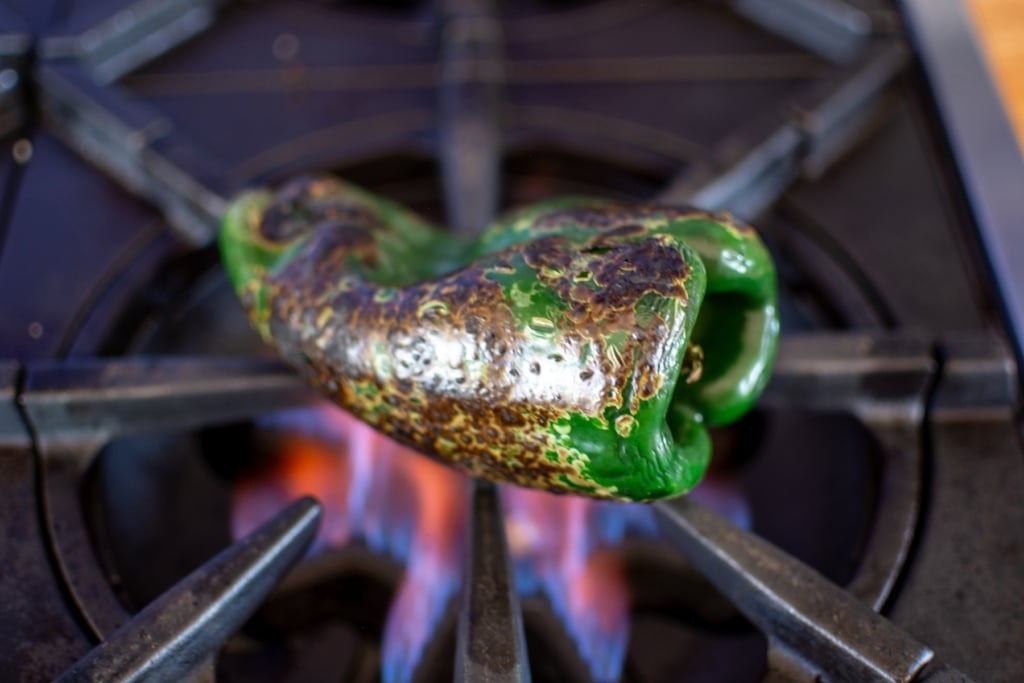 a pepper on a flame charred