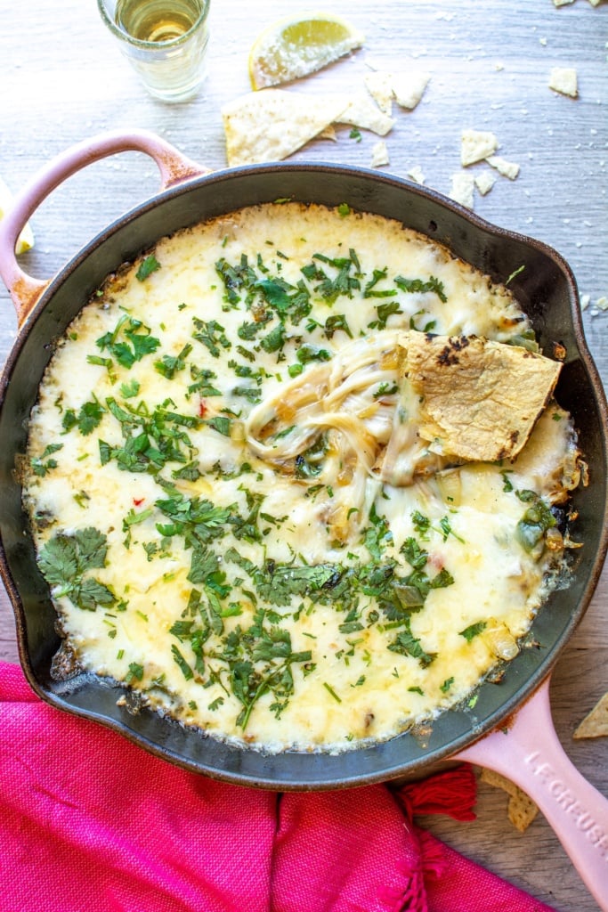 A pan with queso in it with a tortilla in it