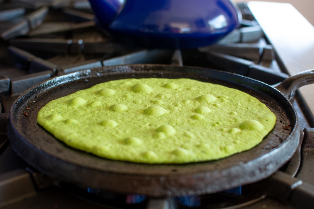 a tortilla on a comal