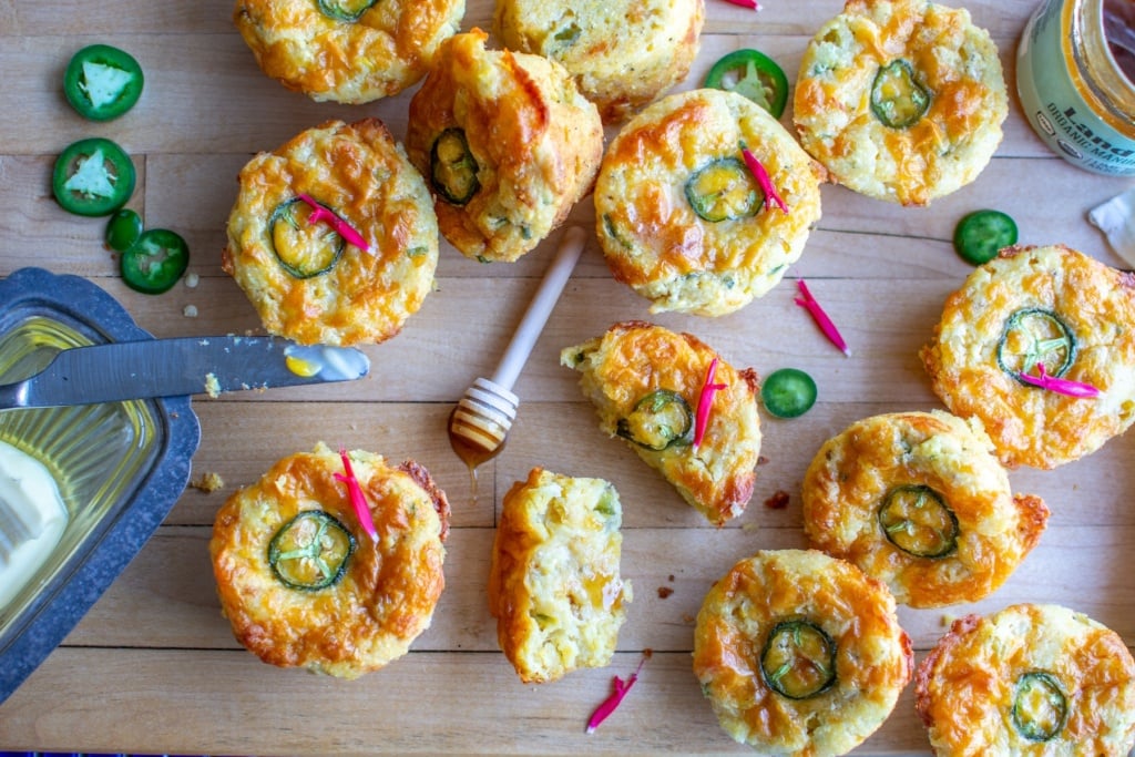 Mexican cornbread muffins on a cutting board