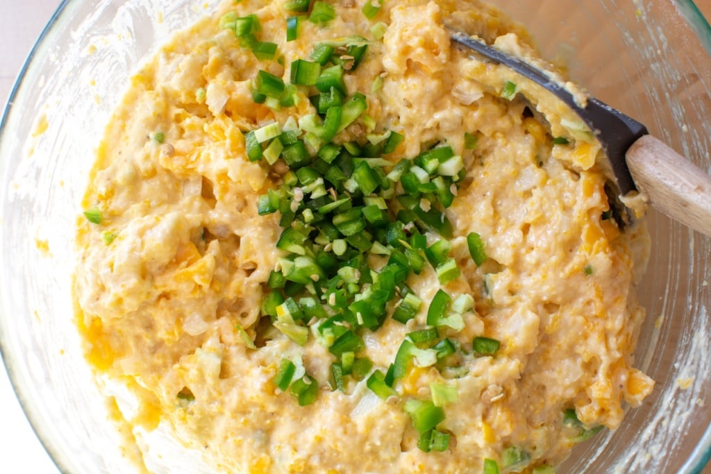 chopped jalapeños on top of cornbread mixture