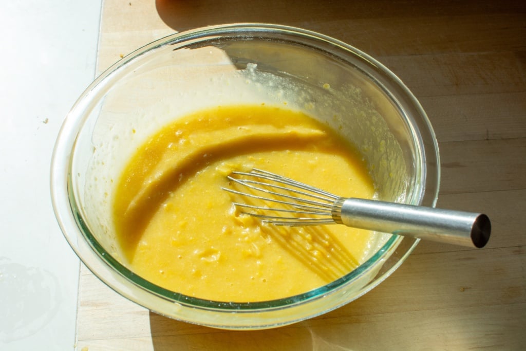 wet ingredients in a bowl for cornbread