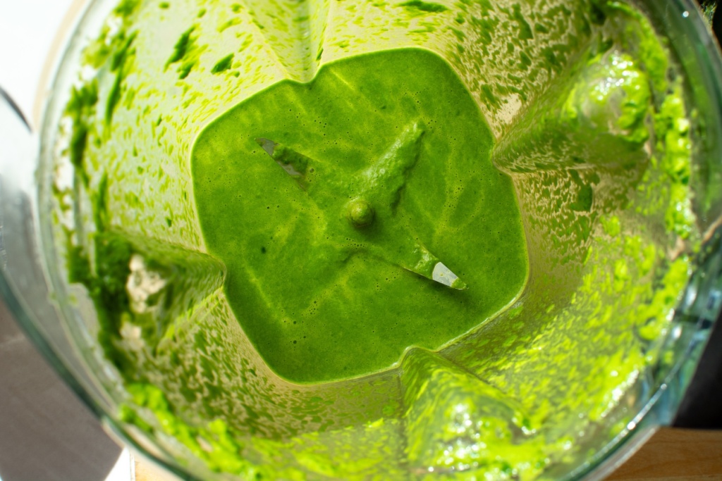 green liquid in a blender