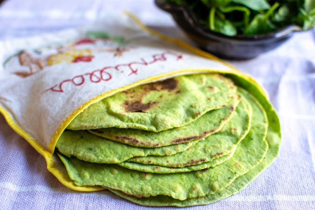 a stack of tortillas in a cloth
